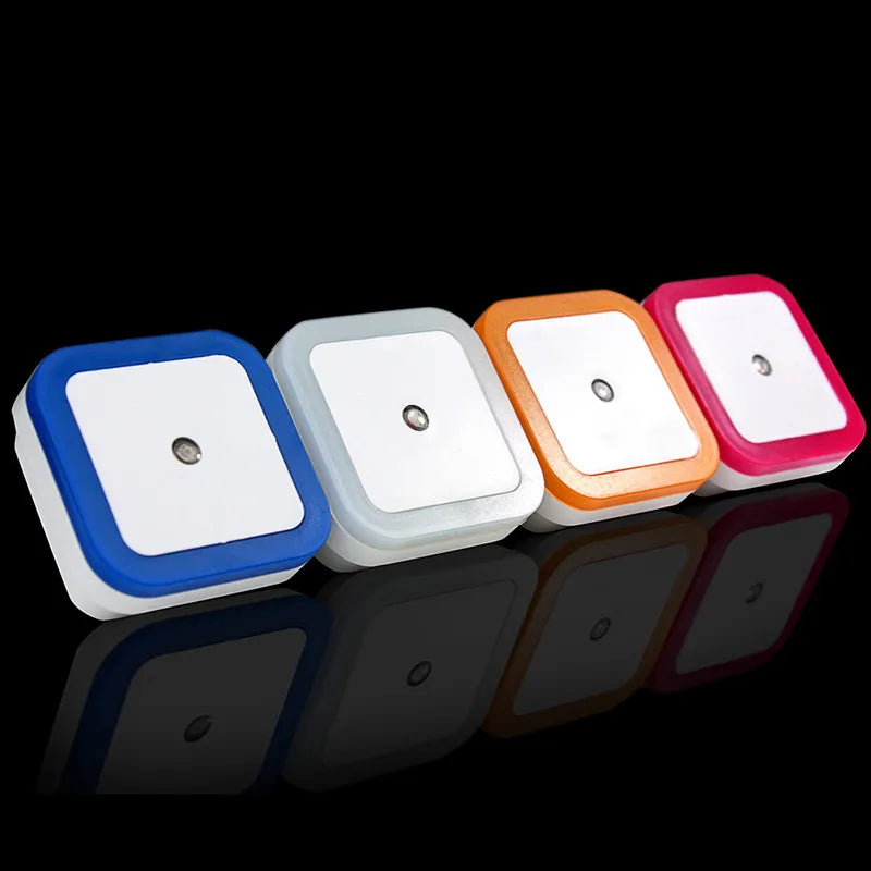 Four colorful night lights on a black background