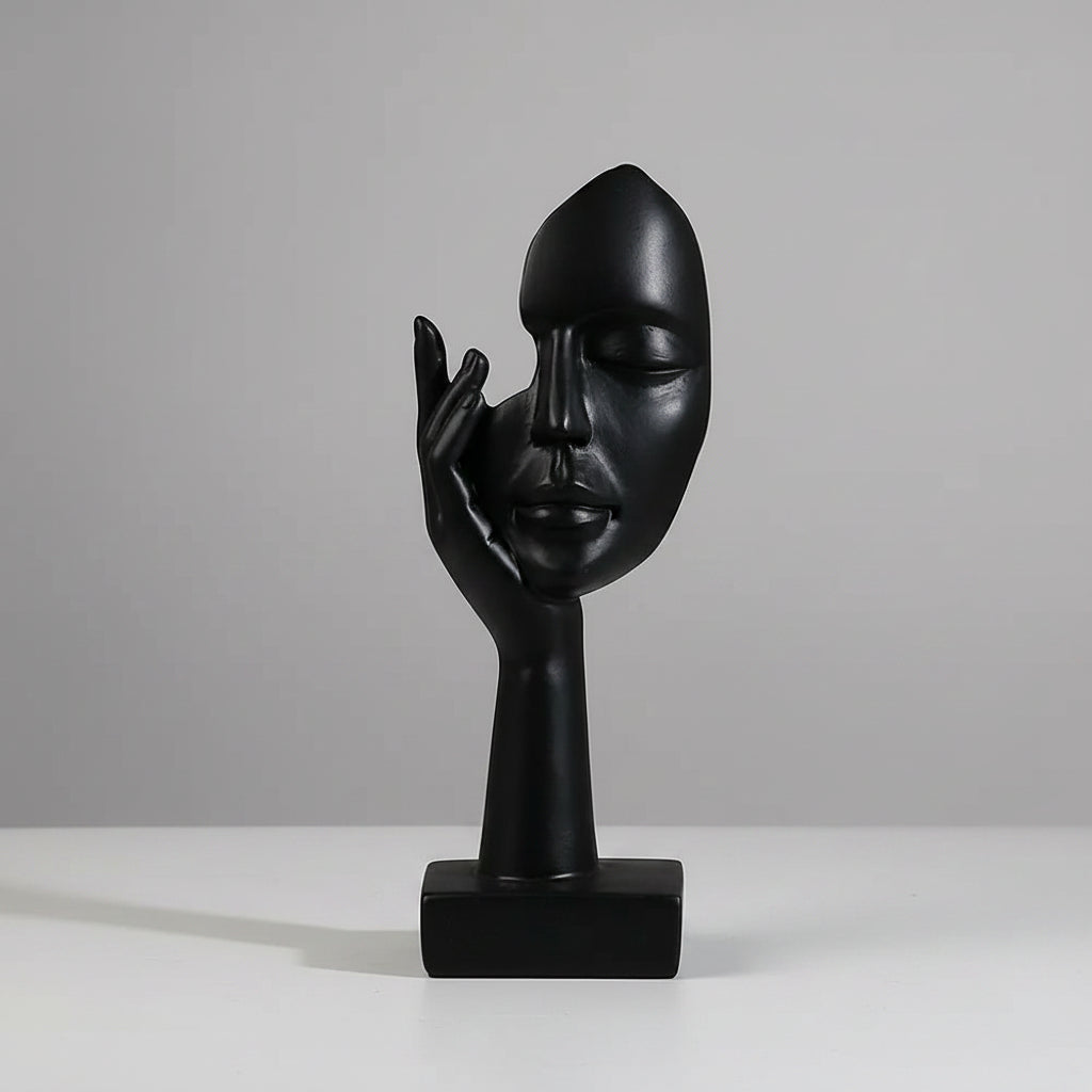 Black abstract sculpture with measurements on a dark background