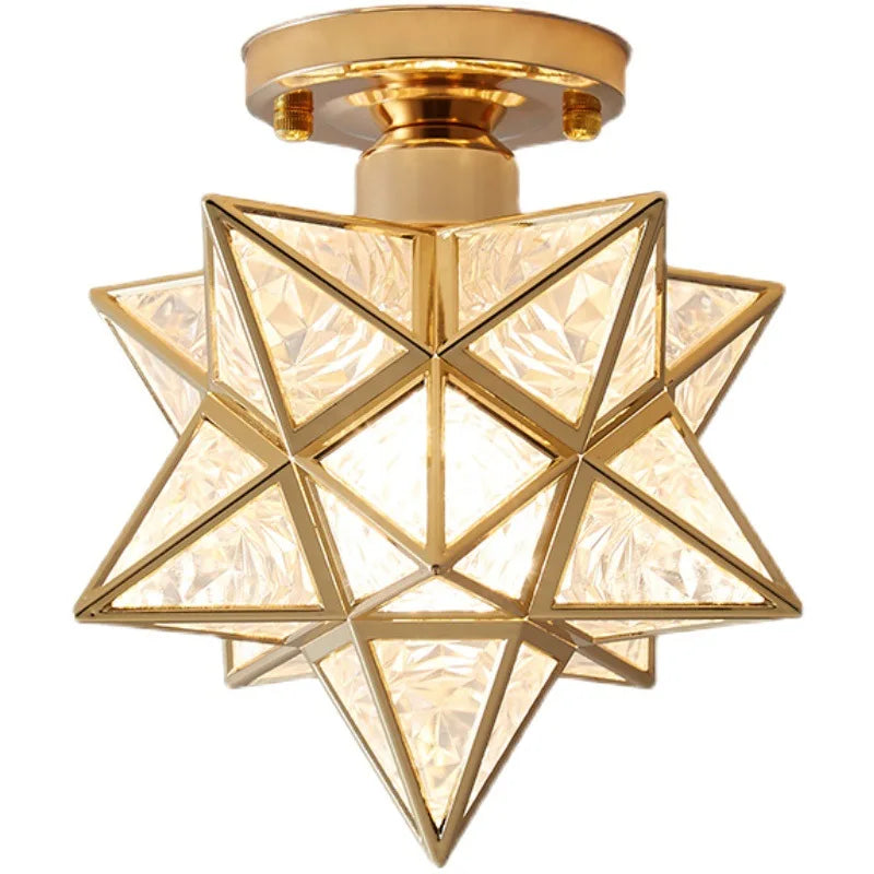 Gold geometric ceiling light fixture on a white background