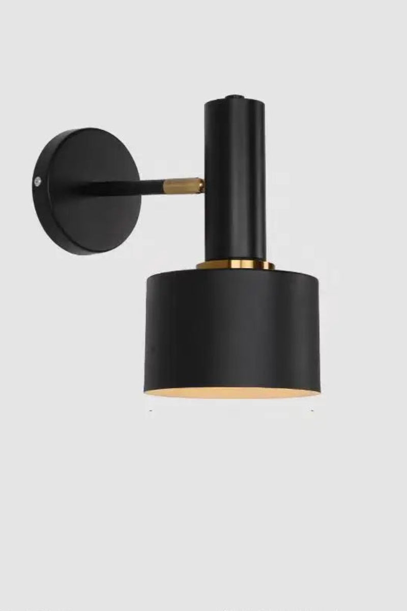 Black wall lamp with gold accent on a white background