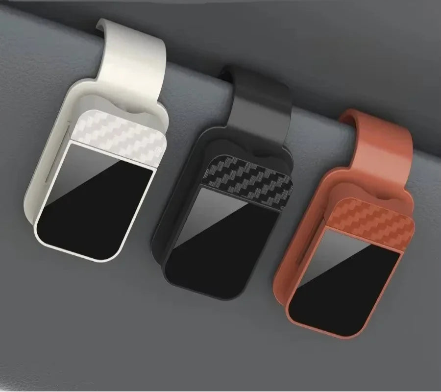 Car carbon fiber patterned eyeglass holders on a gray background