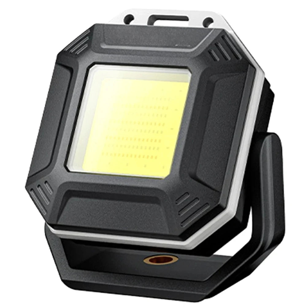 Black and gray work light on a white background