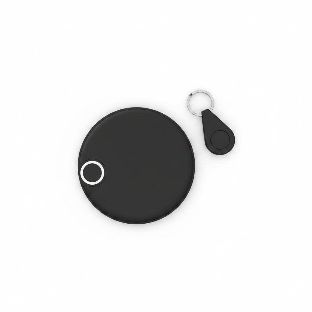 Black round device with a smaller circular device on a white background