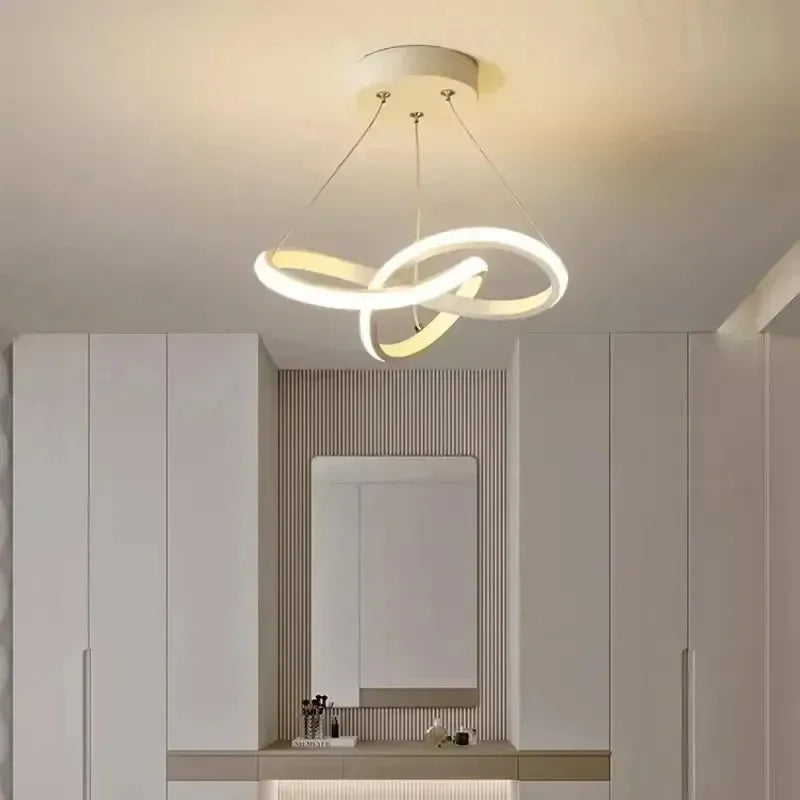 Modern ceiling light fixture in a minimalistic room with neutral colors