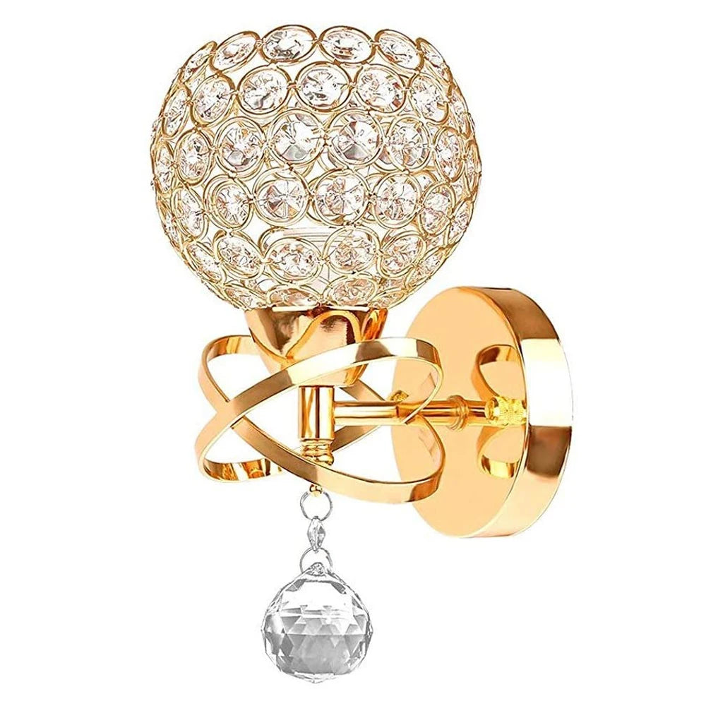 Gold wall sconce with crystal ball design on a white background