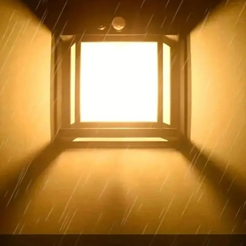 Square light fixture with rain simulation on a dark background
