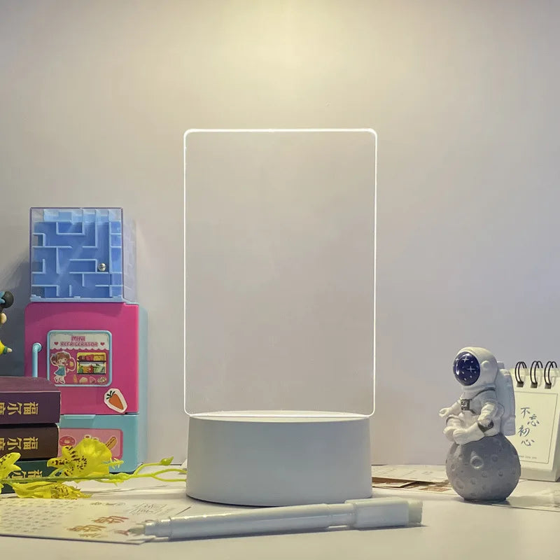 White rectangular lamp on a desk with books and decorative items in the background