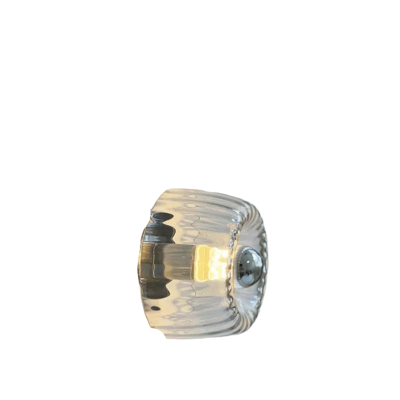 Glass wall light fixture with dimensions on a white wall background