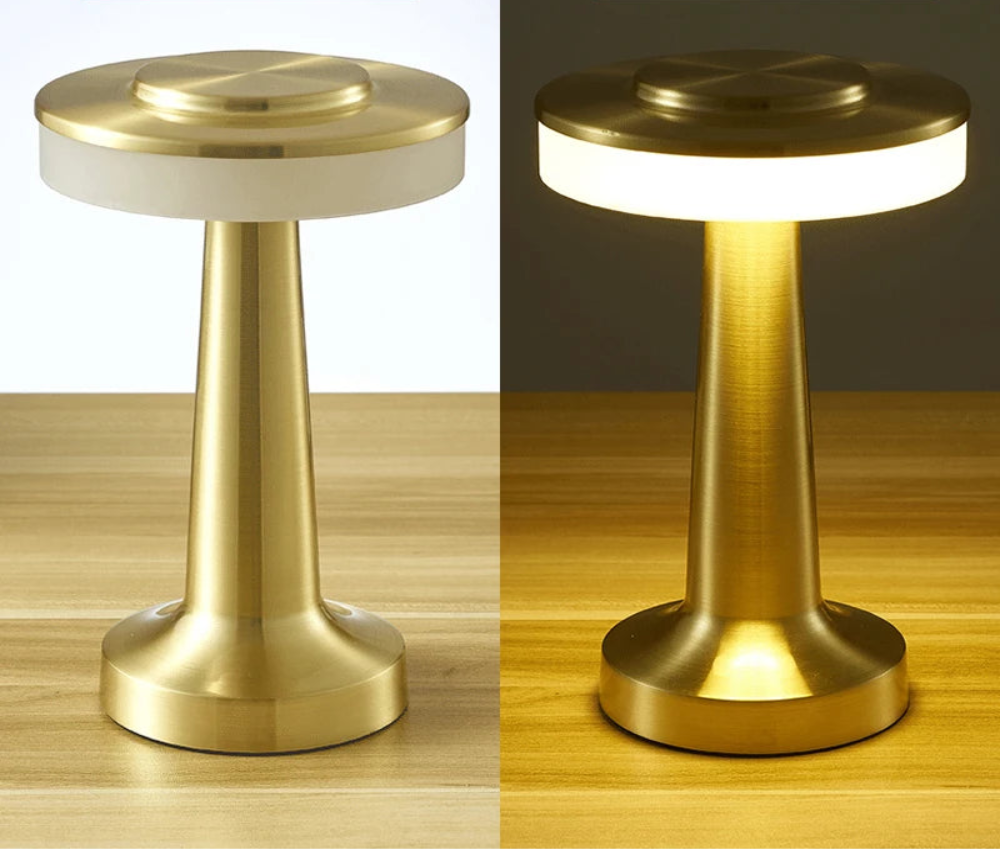 Gold door stopper with light feature on a wooden surface, showing before and after lighting effects.