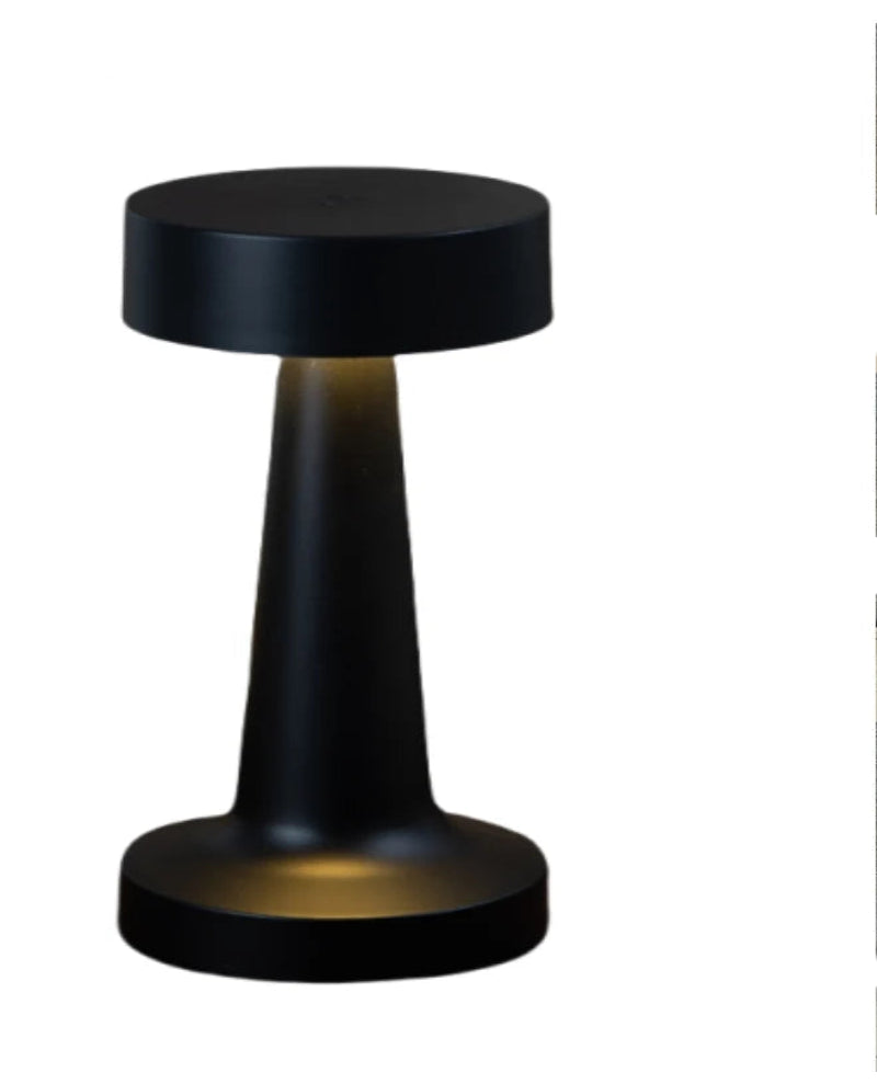 Black lamp with three color options displayed on a white background
