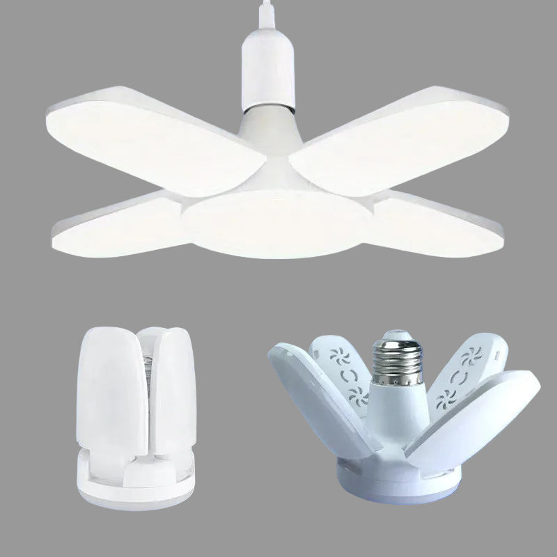 Fluorescent light bulb with multiple sockets on a blue background