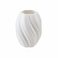White textured vase with dimensions indicated on a white background
