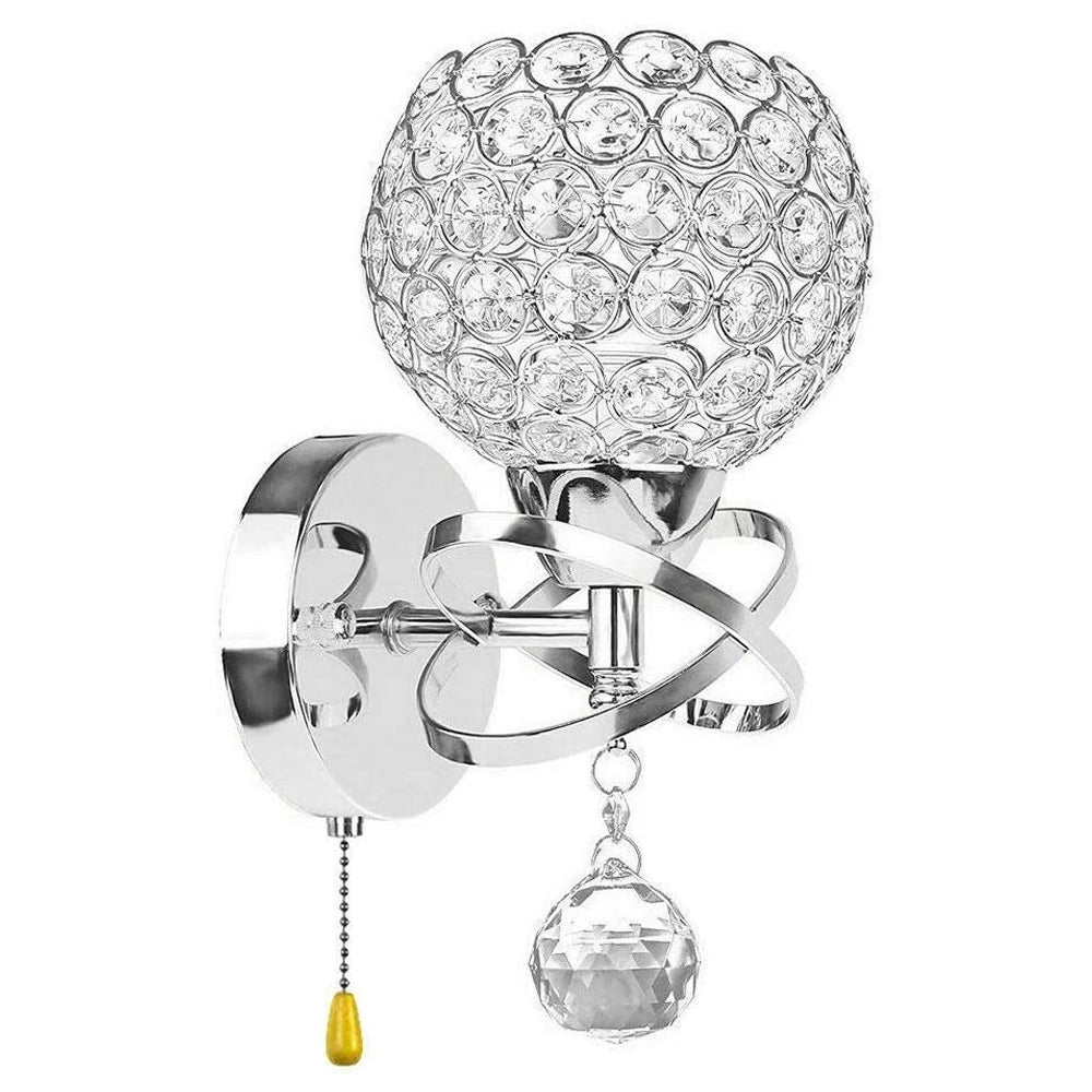 Decorative wall light fixture with crystal ball design on a white background