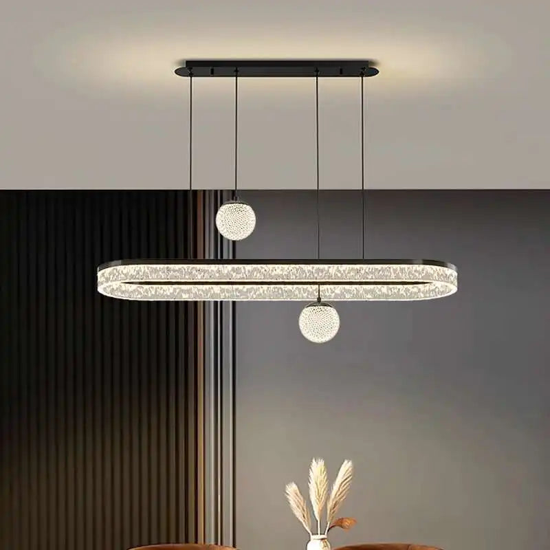 Modern pendant light fixture in a room setting with a neutral background