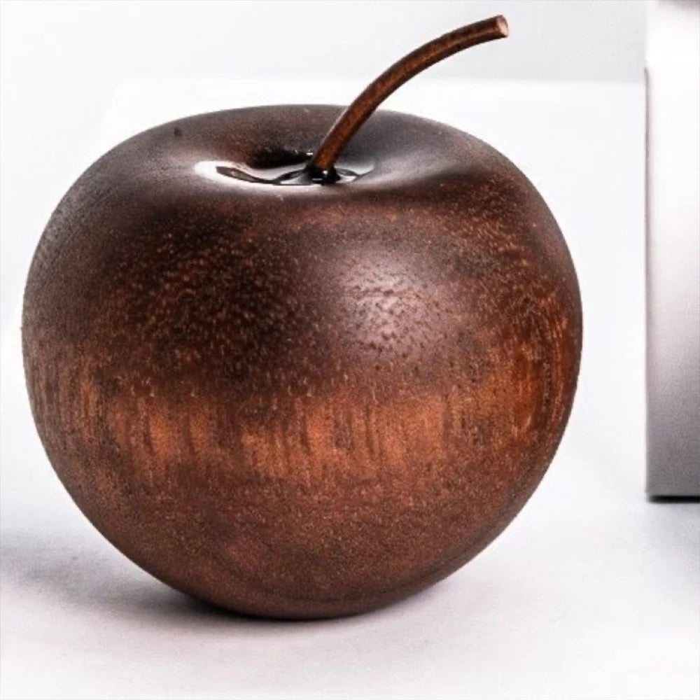 Decorative apple sculpture on a white background
