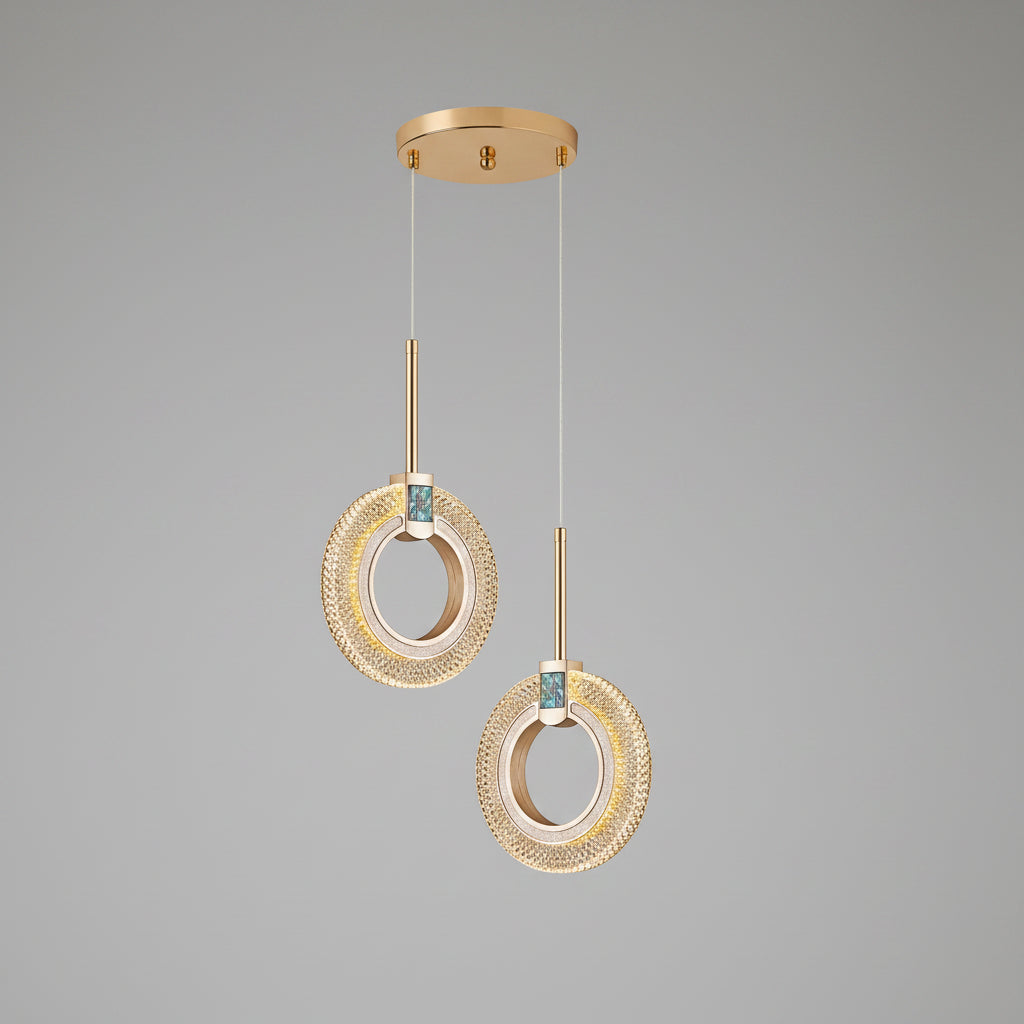Gold pendant light with measurements on a black background