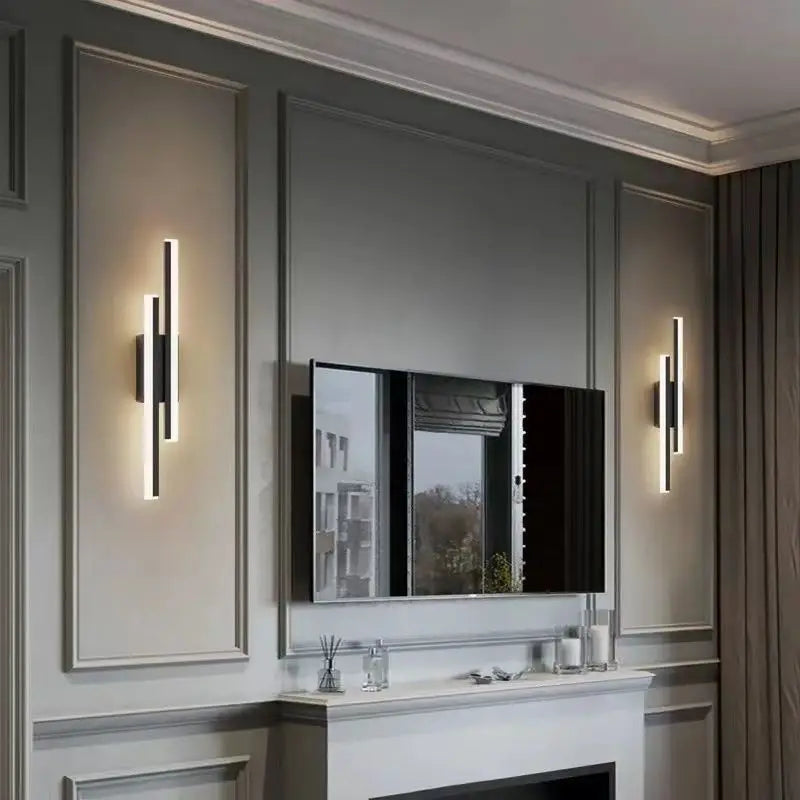 Modern bathroom interior with a mirror, lights, and decorative elements.