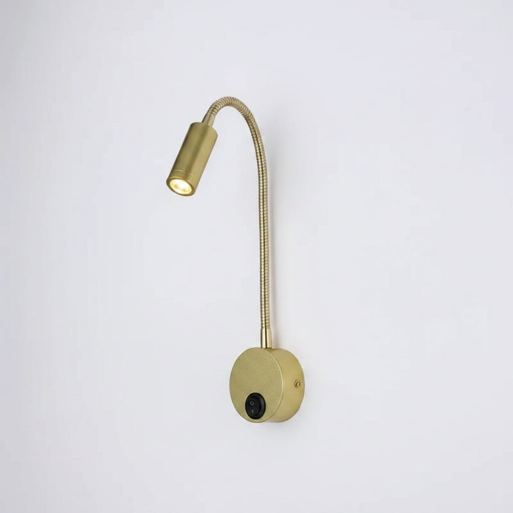 Gold flexible reading lamp with switch on a white background