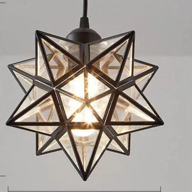 Geometric pendant light with star-shaped design on a gray background
