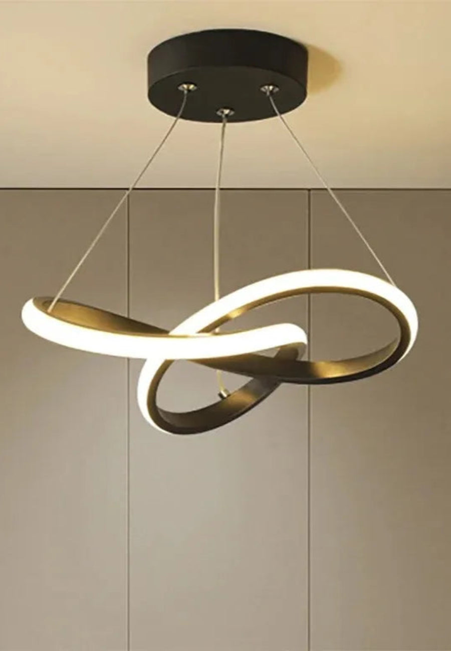 Modern pendant light with interlocking rings on a neutral background
