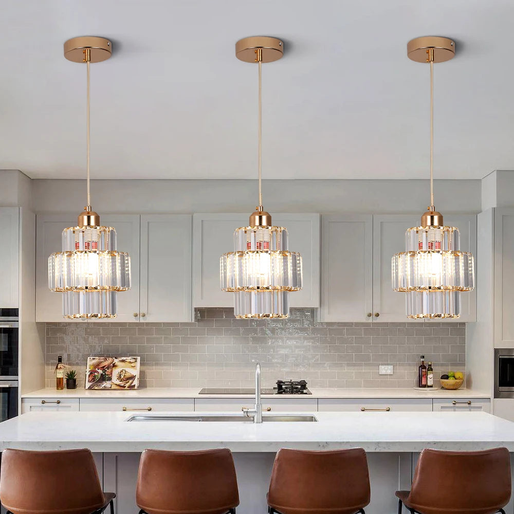 Modern kitchen with pendant lights and a kitchen island.