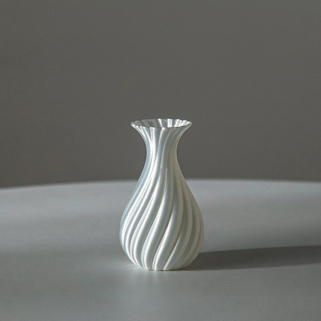 White textured vase on a gray surface