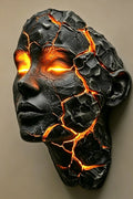 A black cracked stone-like wall sculpture with glowing orange fissures and bright orange eyes, shown against a plain beige wall with a vertical measurement marker reading 23cm/9.06inch.