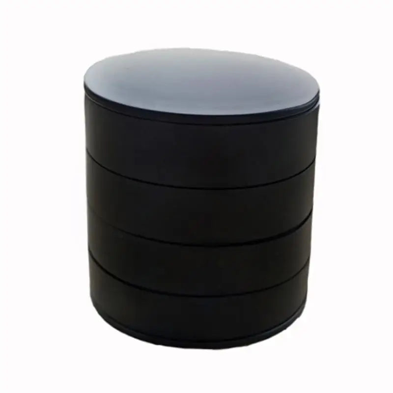 Black cylindrical container with a gray lid on a white background
