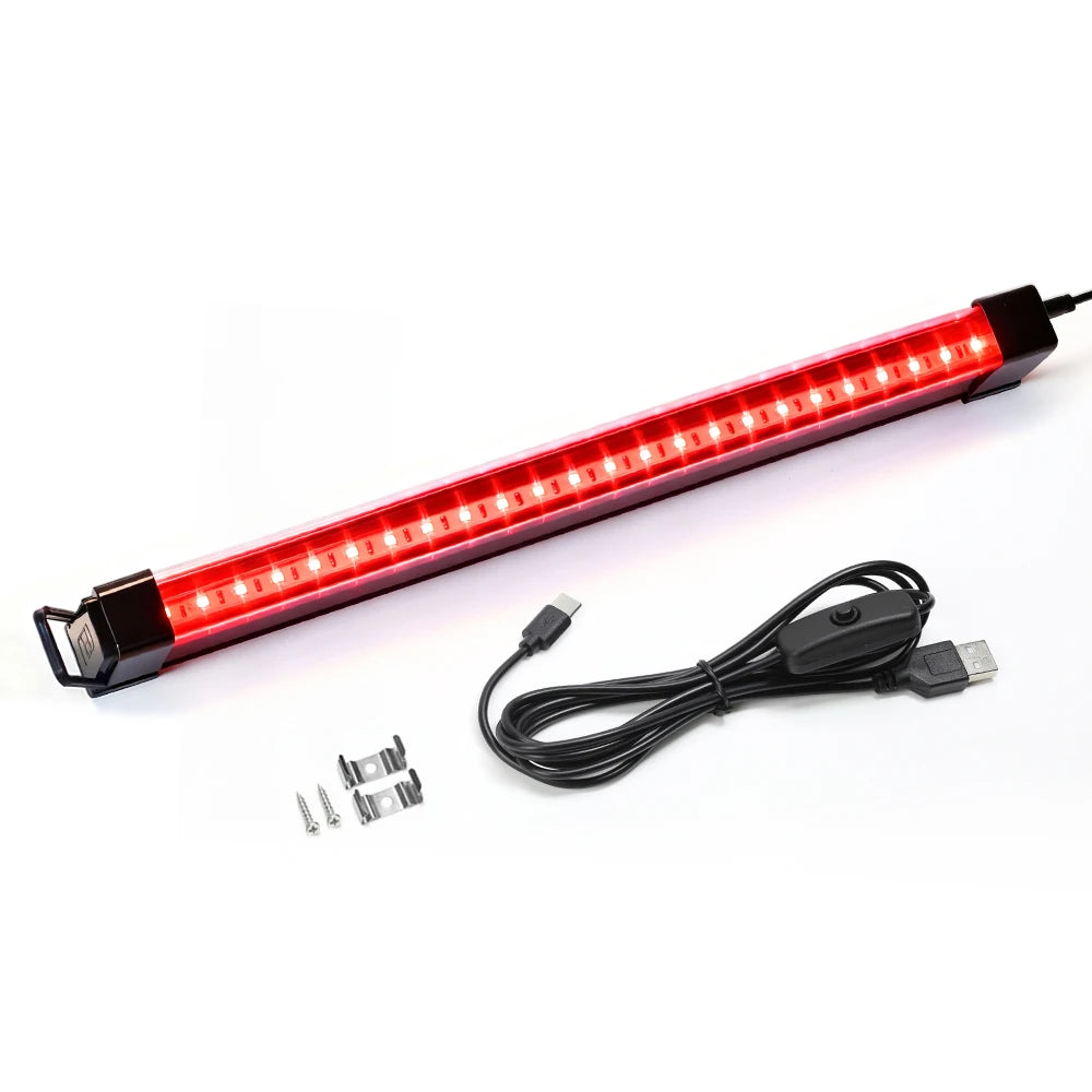 Red LED light bar with USB cable and connectors on a white background