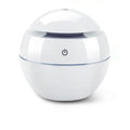White spherical device with power symbol on a white background