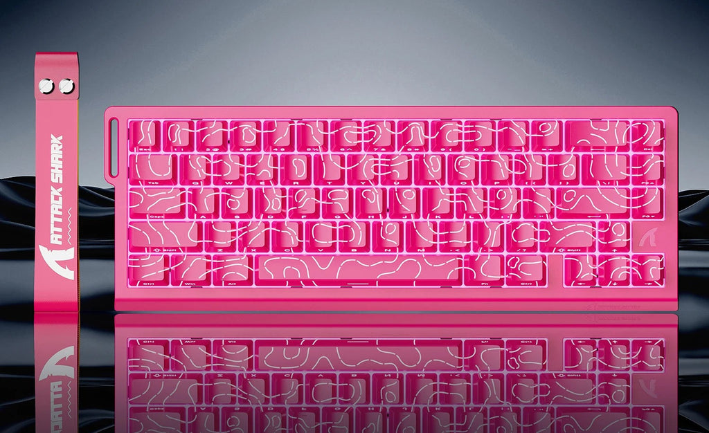 Rose red keyboard with Attack Shark branding on a reflective surface