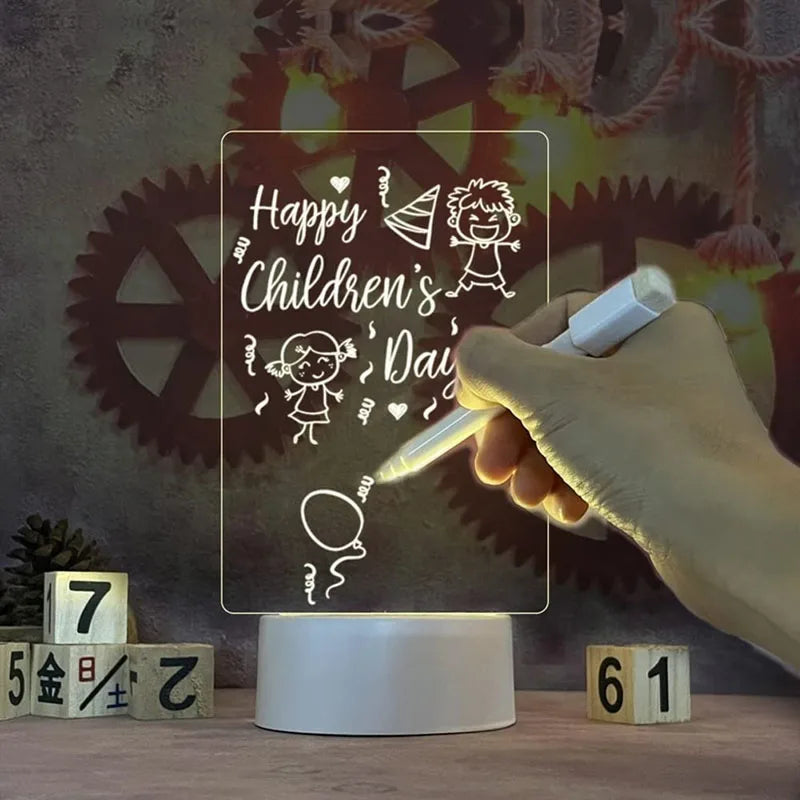 Children's Day-themed light-up sign with hand holding a pen, surrounded by decorative elements.