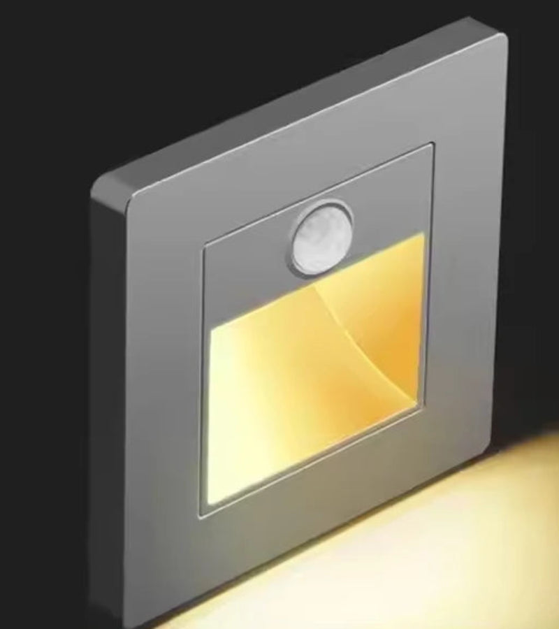 Square LED light with motion sensor on a dark background