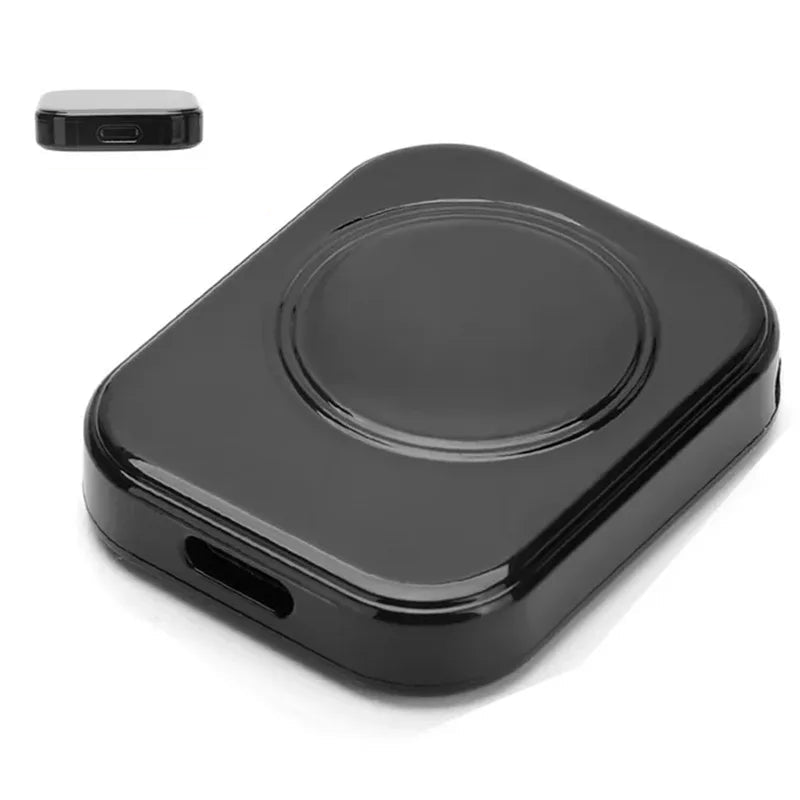Black wireless charging pad with lightning input on a white background
