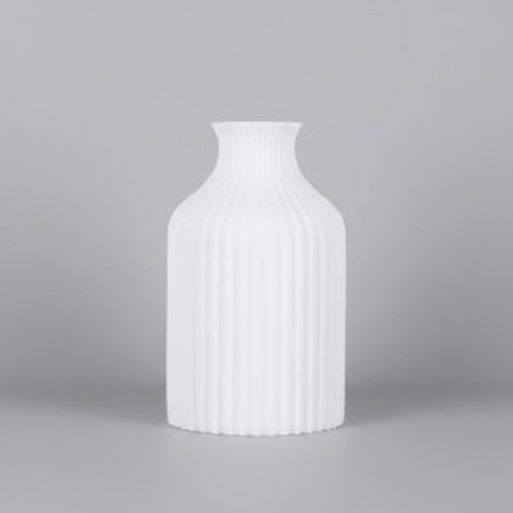 white robbed vase
