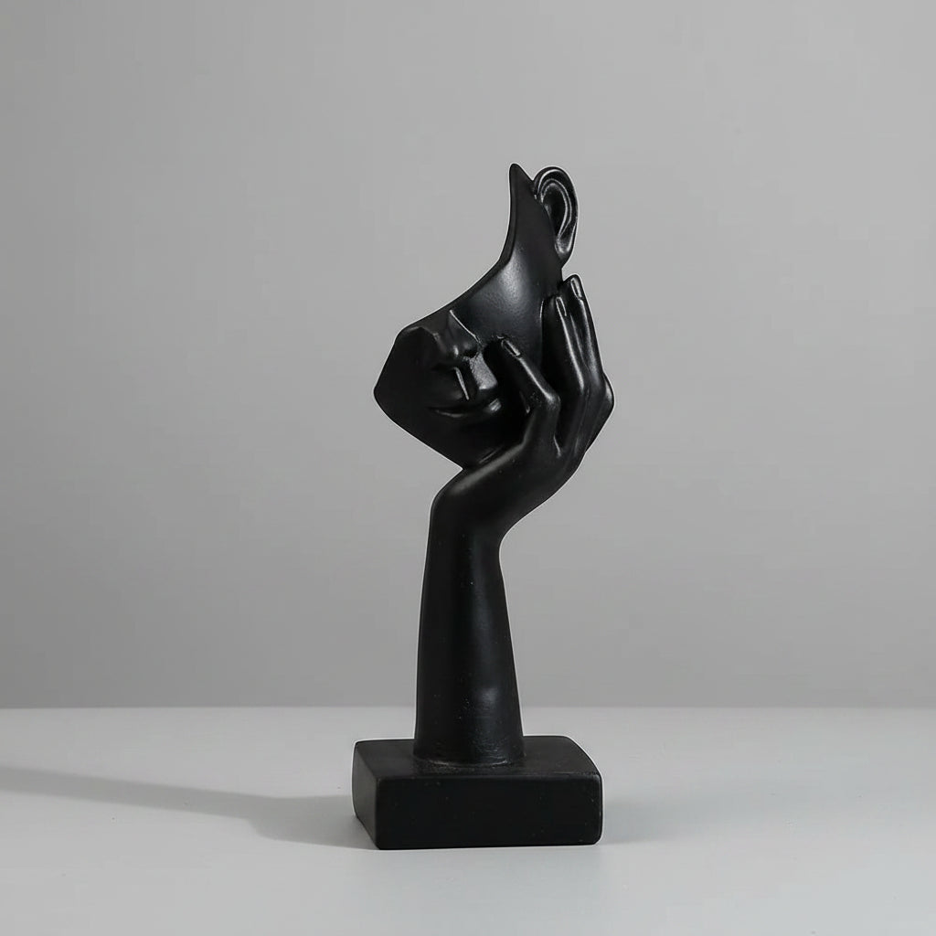 Black abstract sculpture with dimensions indicated on a gray background