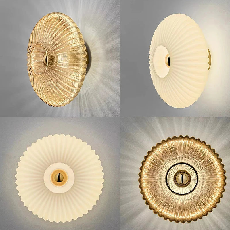 Four different views of a decorative wall light fixture on a gray background.