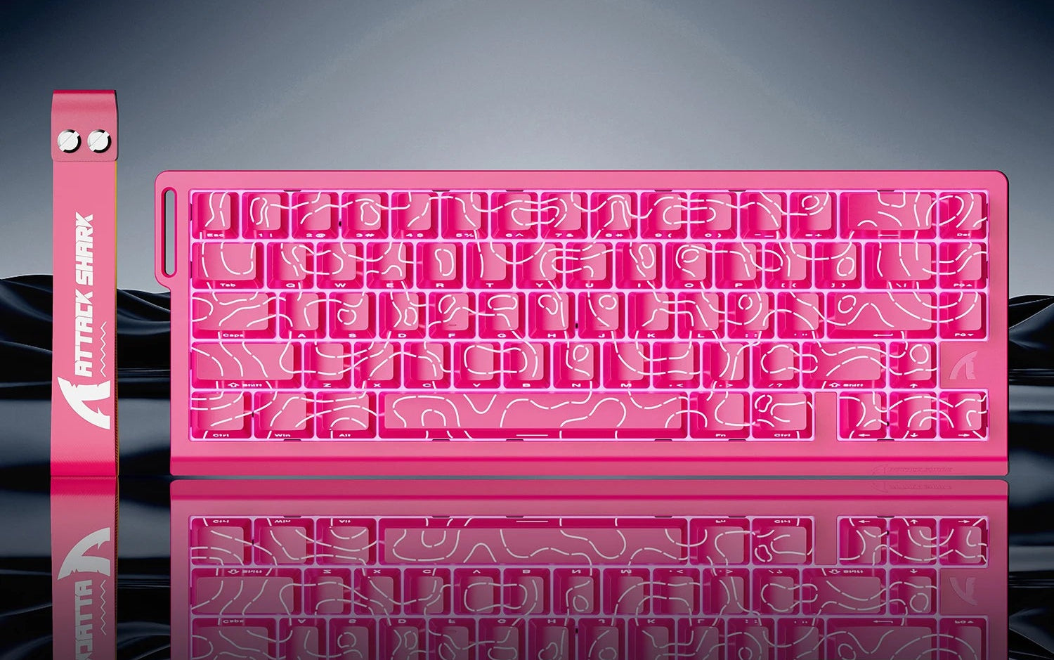 Rose red keyboard with Attack Shark branding on a reflective surface