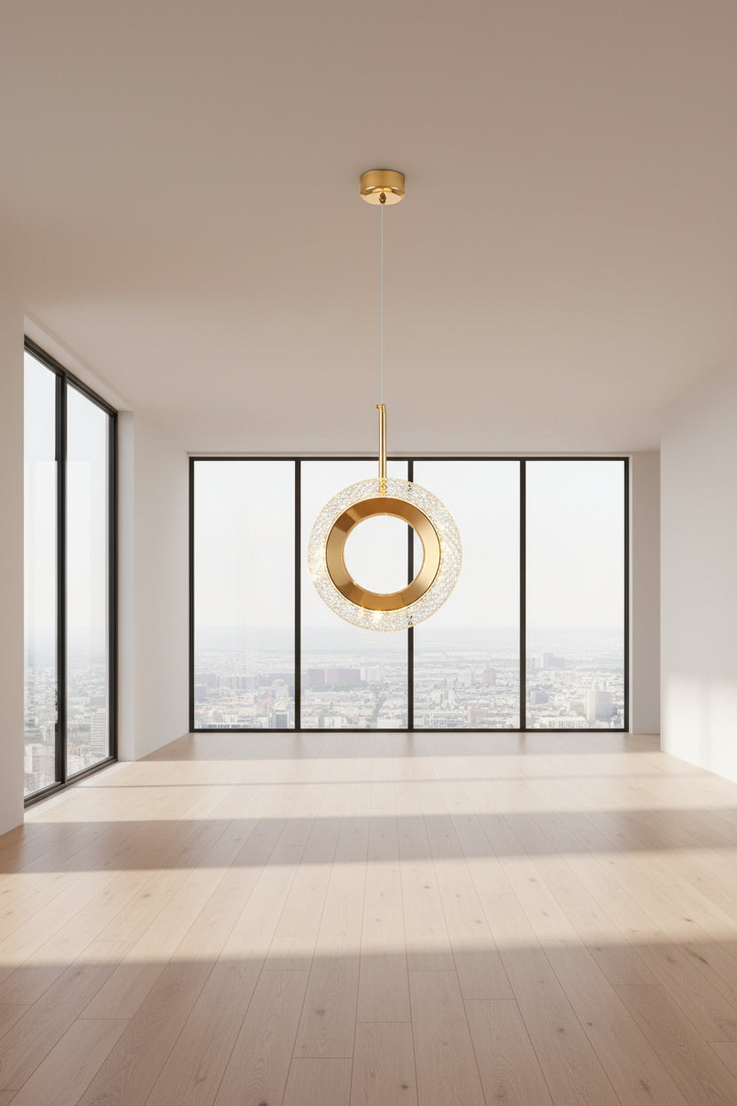 Gold pendant light with measurements on a dark background