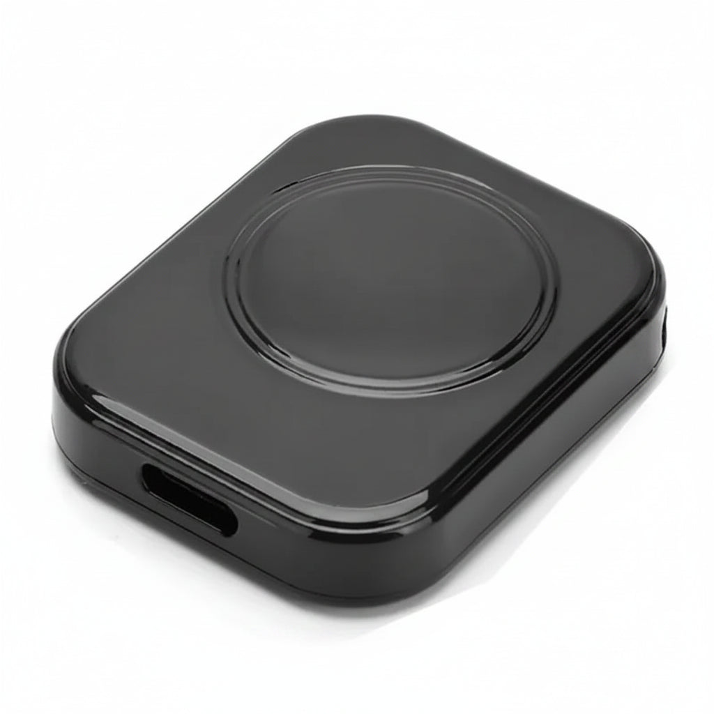 Black wireless charging pad with lightning input on a white background