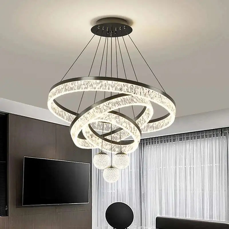 Modern chandelier with multiple rings in a living room setting