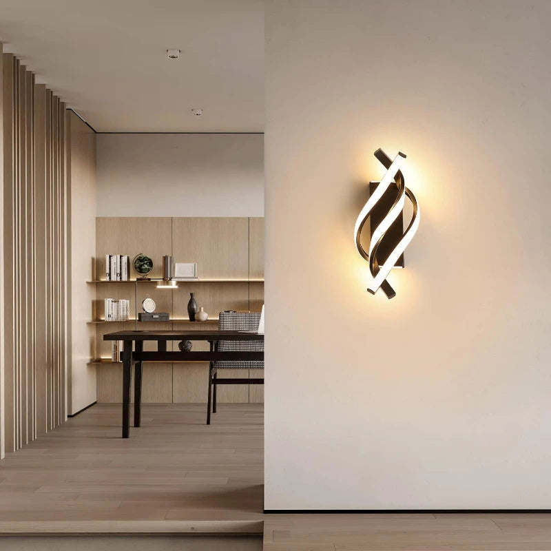 Modern wall sconce in a stylish interior setting with a desk and shelves.
