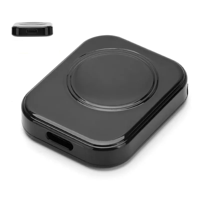 Black wireless charging pad with Type C input on a white background
