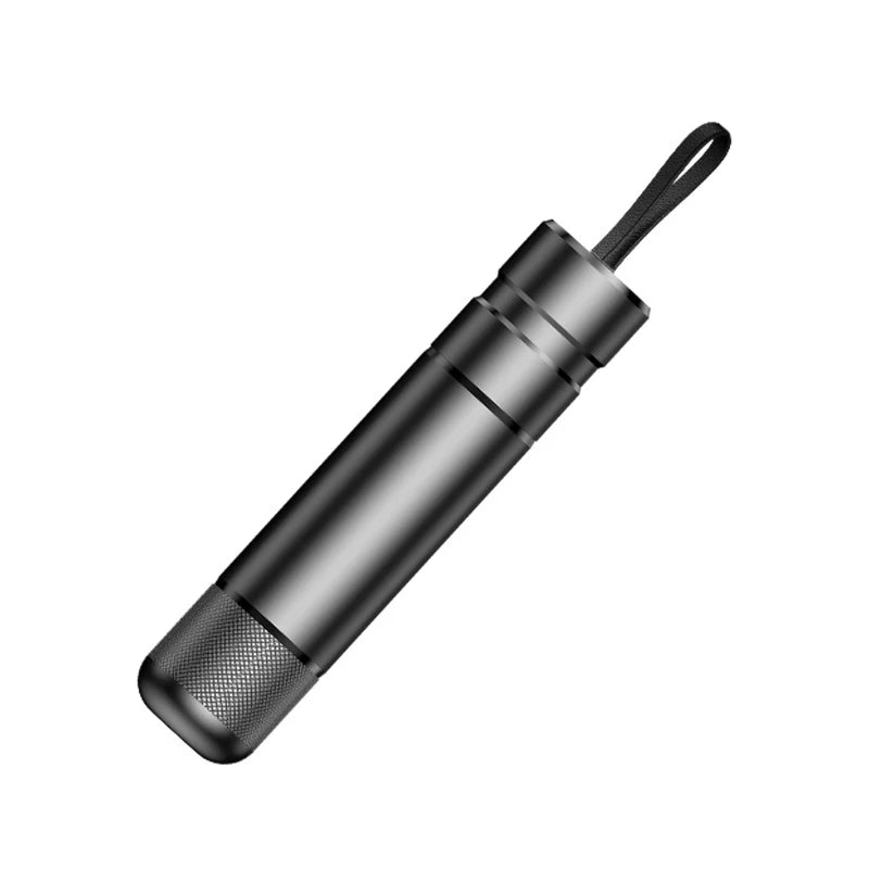 Metallic pen holder with a hook on a white background