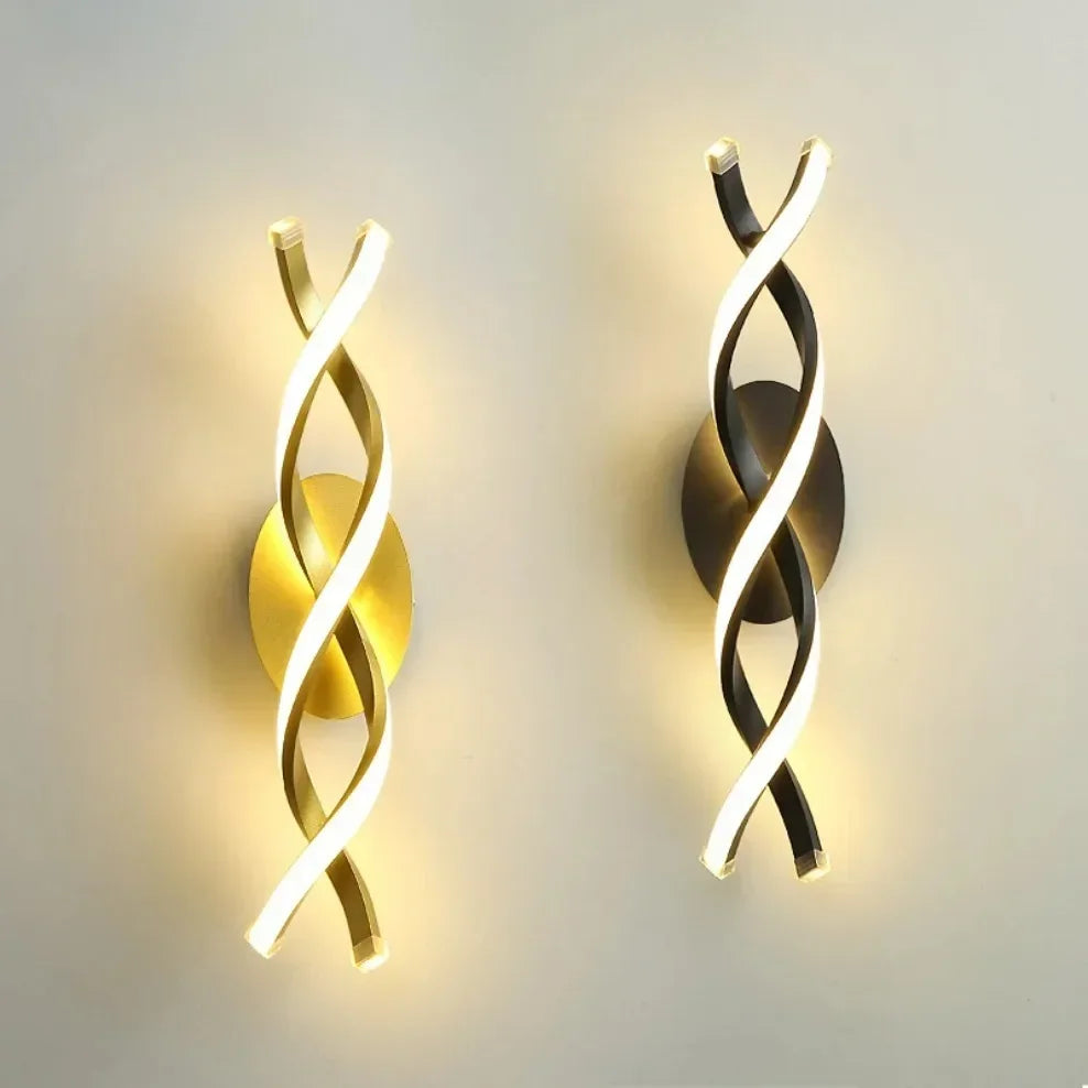 Two modern wall sconces with twisted design on a neutral background