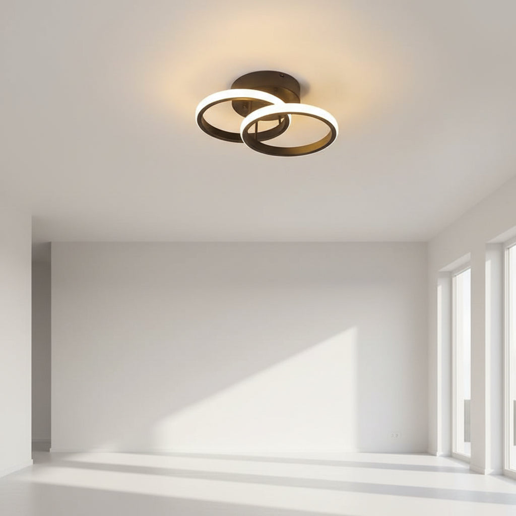 Ceiling light fixture with two circular designs, labeled 'circle black', on a plain background.