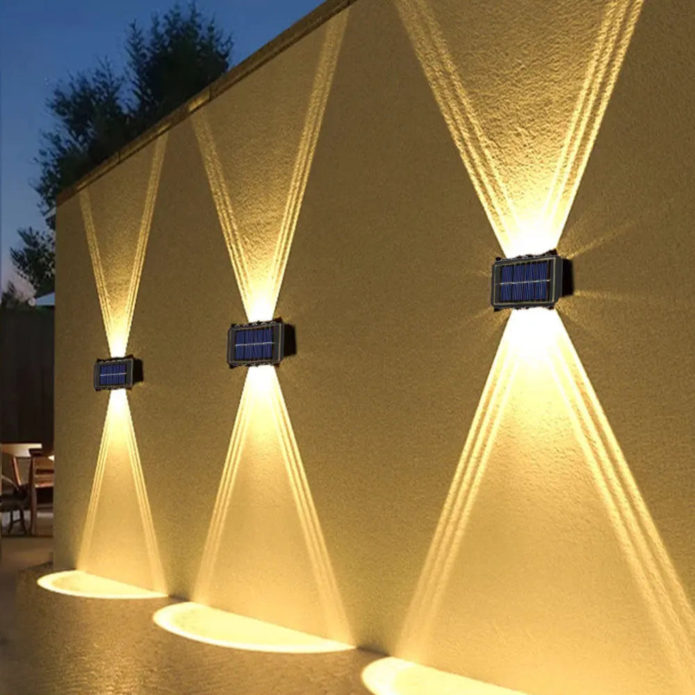 Solar-powered outdoor wall lights on a building exterior