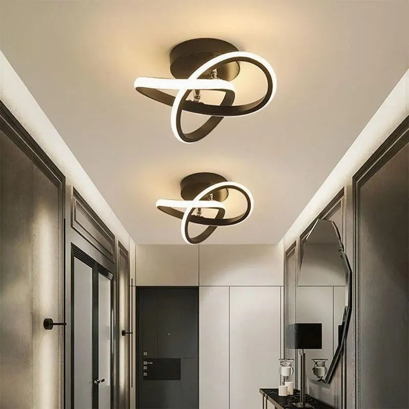 Modern ceiling lights in a stylish hallway with neutral colors.