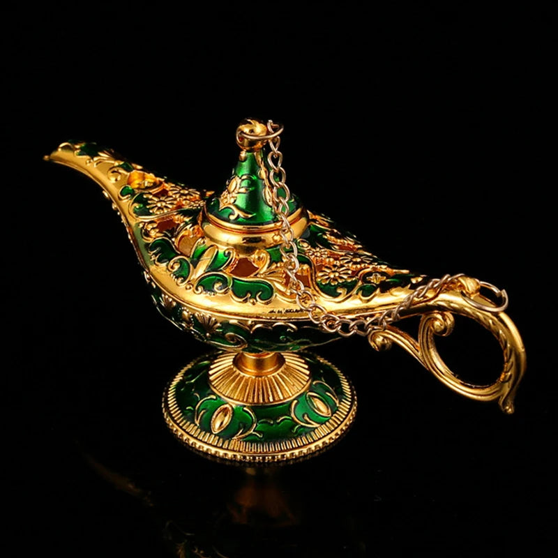 Decorative gold and green lamp on a black background