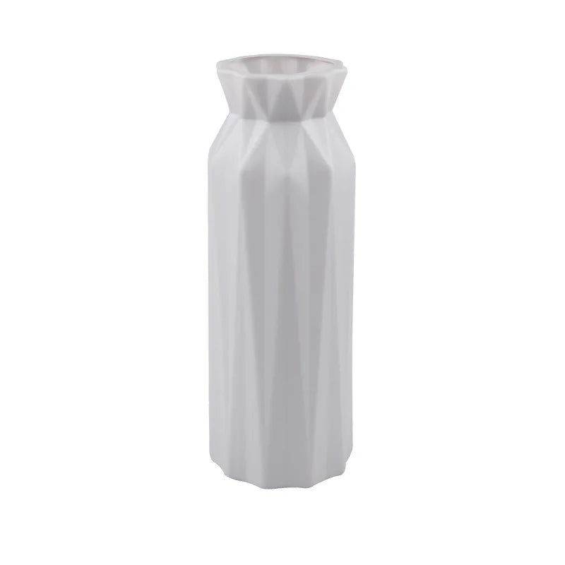 White geometric vase on a white background